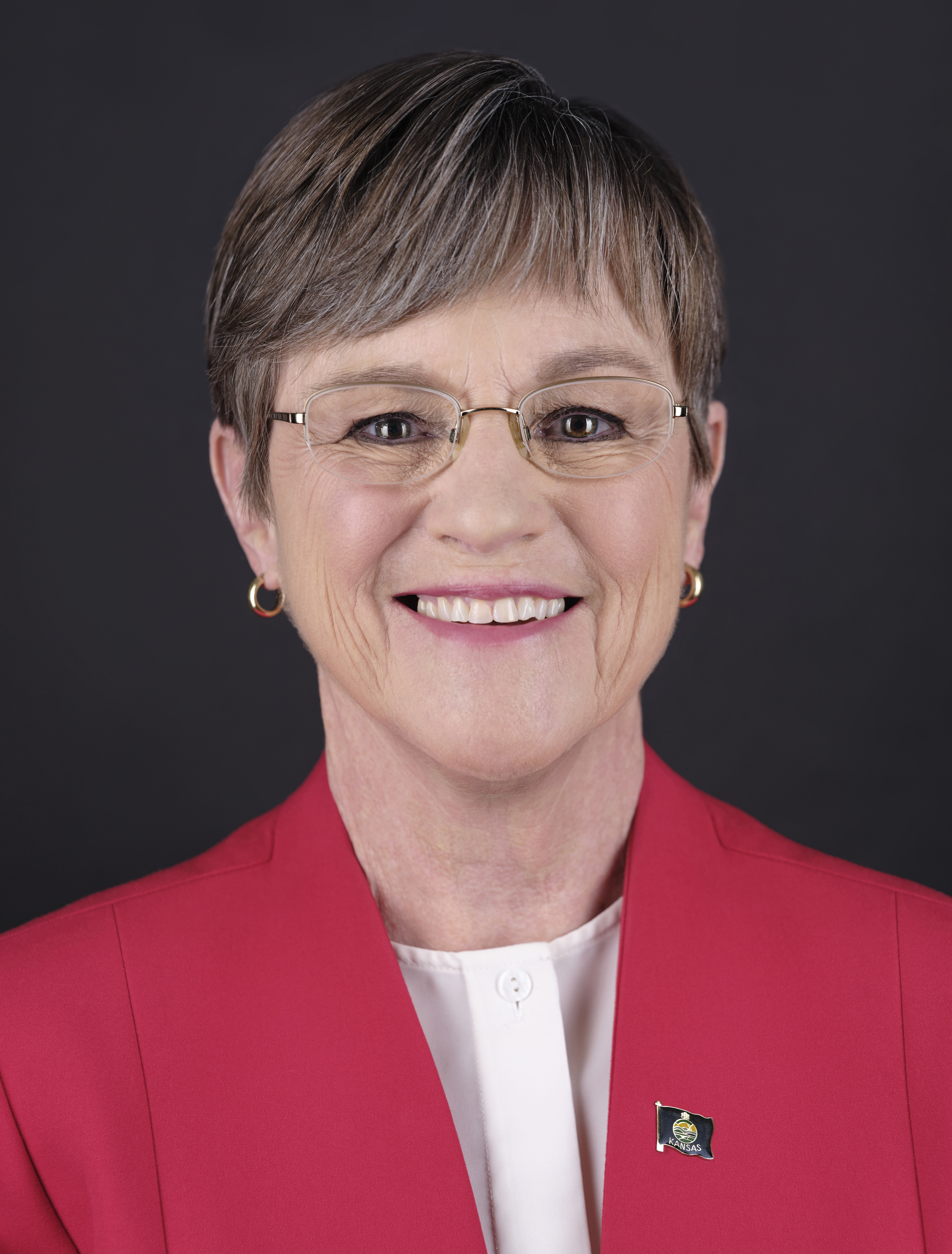 Portrait of Laura Kelly, rendered as a two-tone print