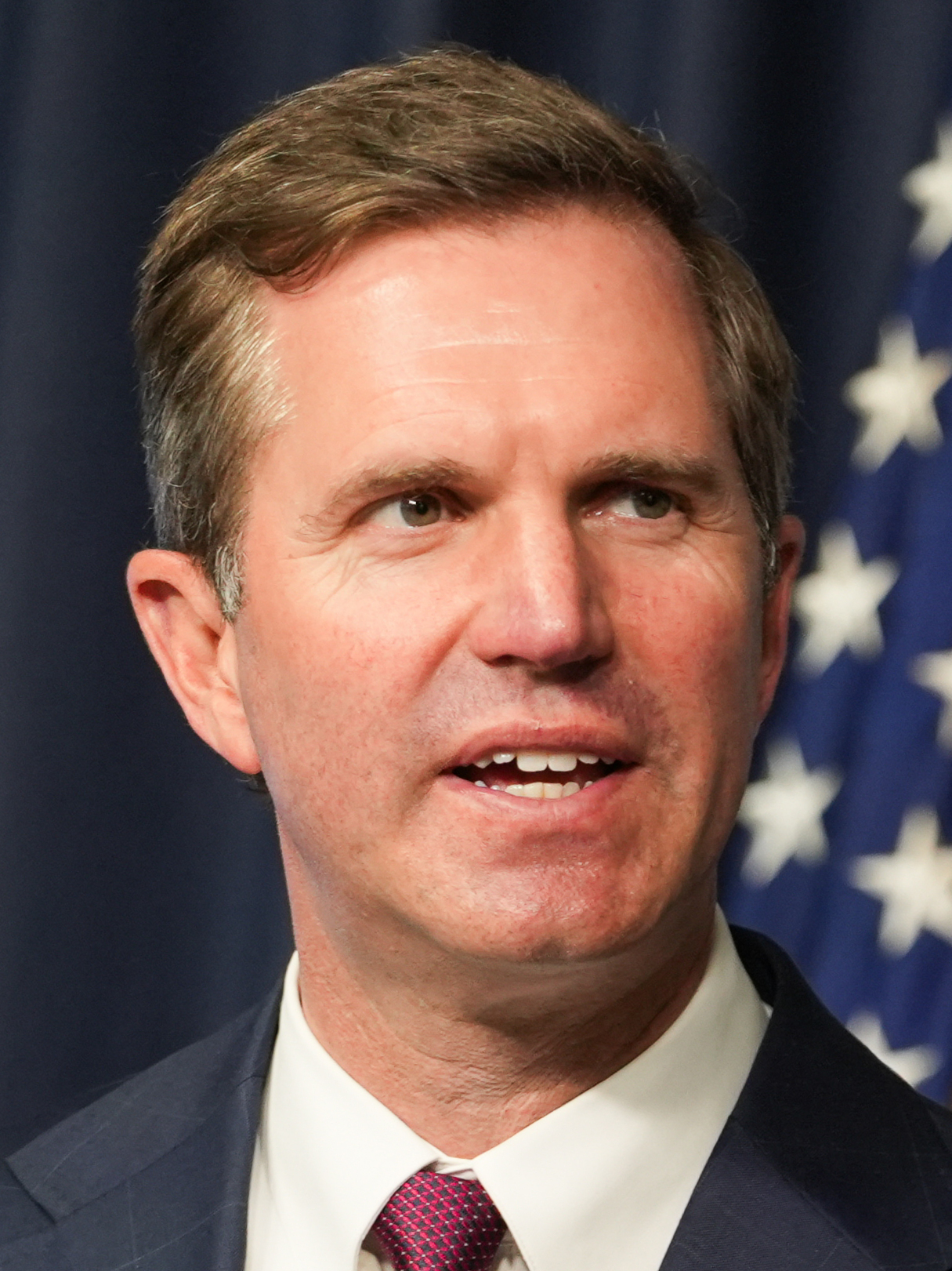 Portrait of Andy Beshear, rendered as a two-tone print